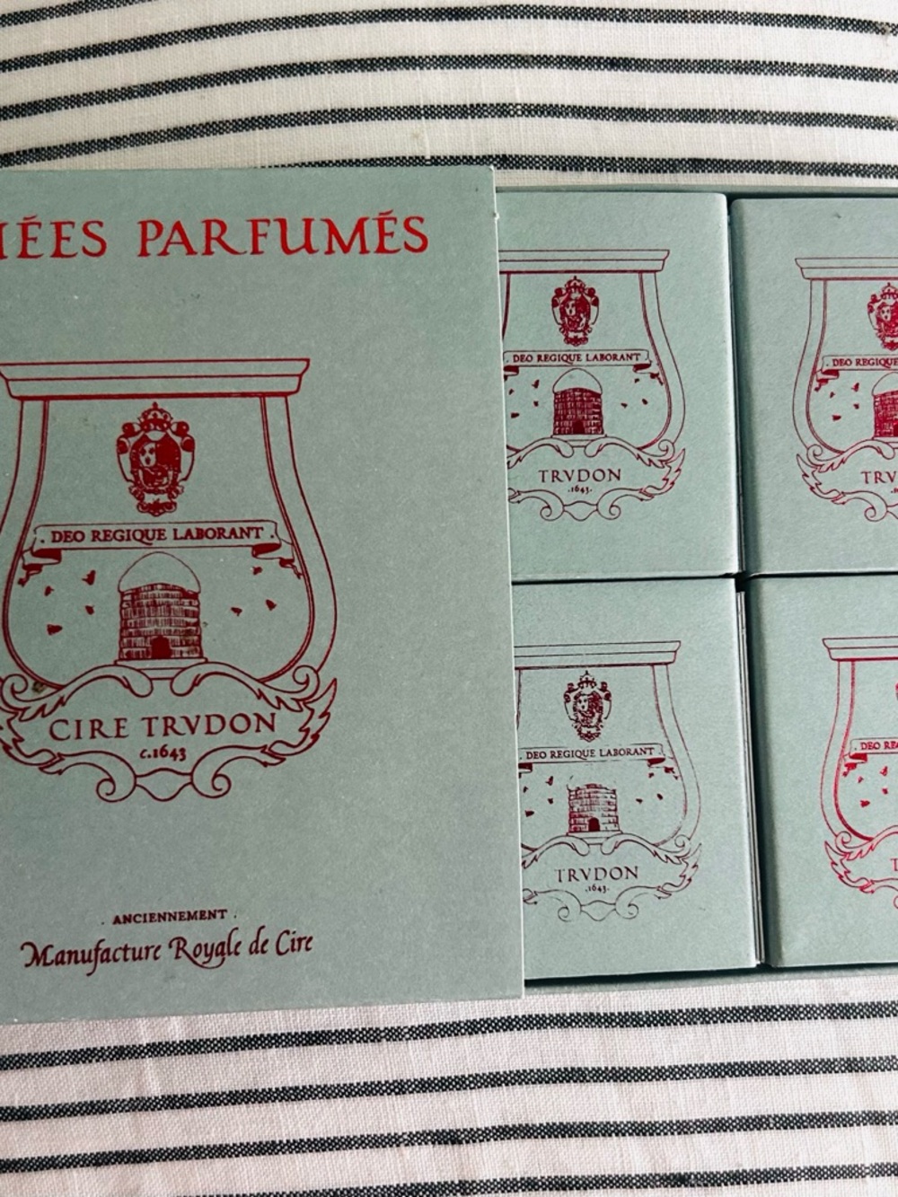 TRUDON Set of four assorted wax cameos.